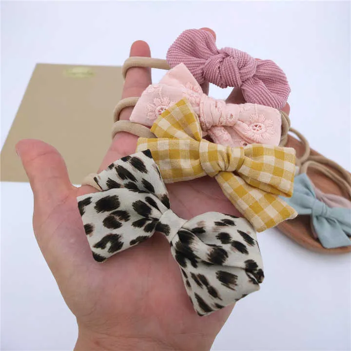 القوس رباطات لحديثي الولادة فتيات صغيرات . Bow Headbands for Newborn Baby Girls Toddlers Nylon
