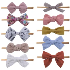 القوس رباطات لحديثي الولادة فتيات صغيرات . Bow Headbands for Newborn Baby Girls Toddlers Nylon